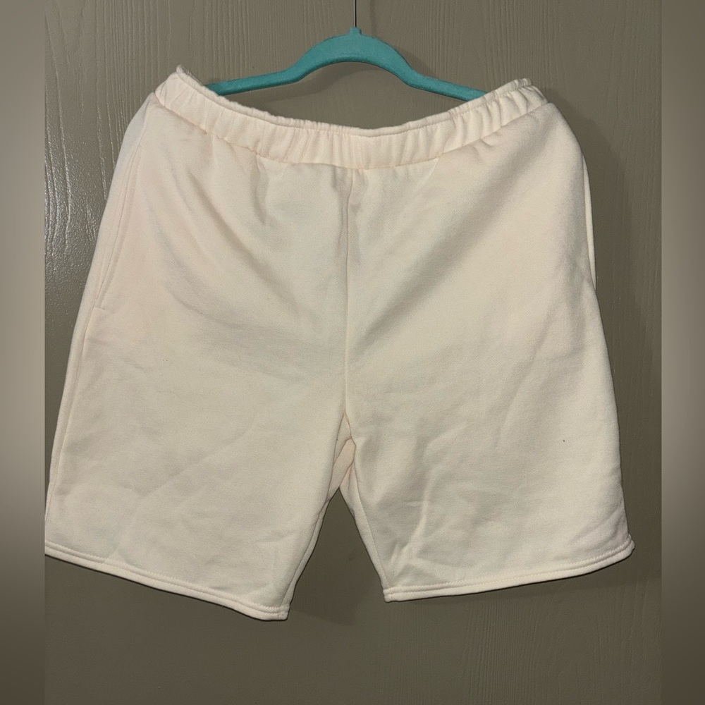 Cream sweatpants shorts